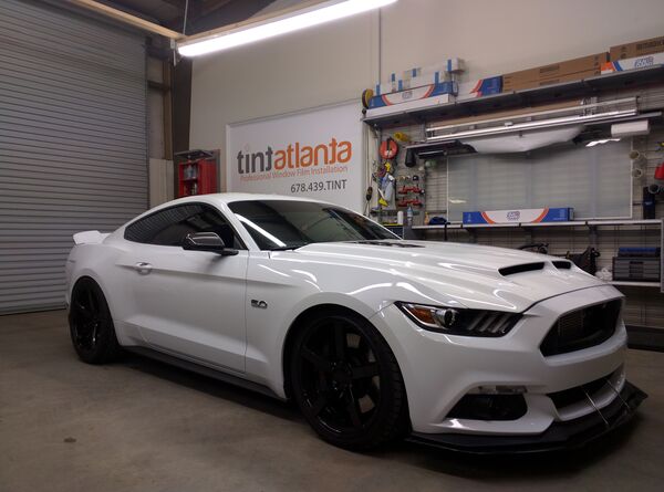 White Ford Mustang GT 5.0 with ceramic window tint installation at Tint Waco Waco